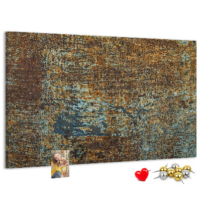 Prikbord met roestig oppervlak en blauwe accenten