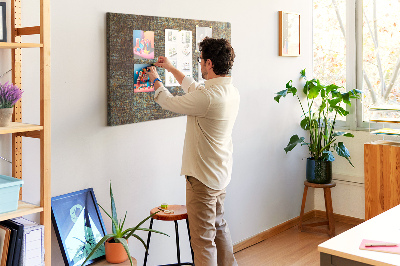 Prikbord met roestig oppervlak en blauwe accenten