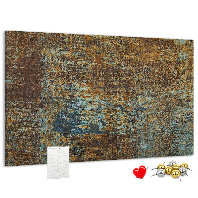 Prikbord met roestig oppervlak en blauwe accenten