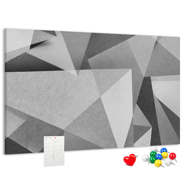 Prikbord met abstracte grijze en zwarte geometrische vormen