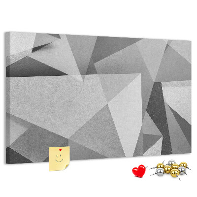 Prikbord met abstracte grijze en zwarte geometrische vormen