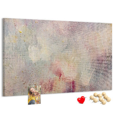 Kurken prikbord met een achtergrond in subtiele pastelkleuren