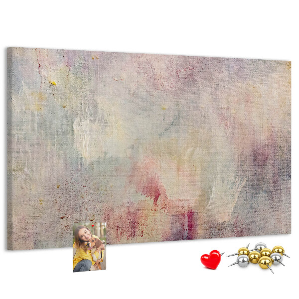 Kurken prikbord met een achtergrond in subtiele pastelkleuren