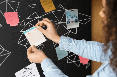 Kurkbord met geometrische witte contouren van de wereld