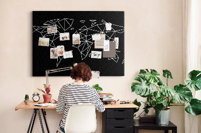 Kurkbord met geometrische witte contouren van de wereld