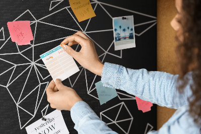 Kurkbord met geometrische witte contouren van de wereld