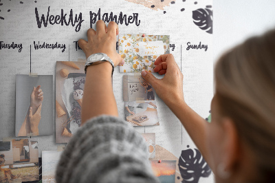 Prikbord met tropische bladeren weekplanner