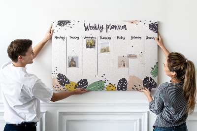 Prikbord met tropische bladeren weekplanner