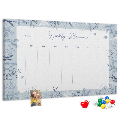 Kurk prikbord met een subtiel patroon voor een winterweekplanning