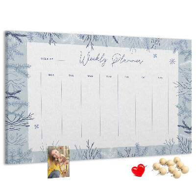 Kurk prikbord met een subtiel patroon voor een winterweekplanning
