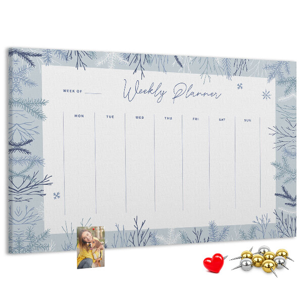 Kurk prikbord met een subtiel patroon voor een winterweekplanning