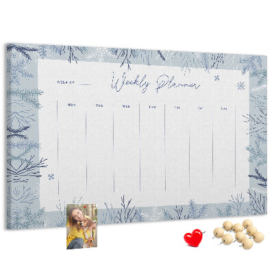 Kurk prikbord met een subtiel patroon voor een winterweekplanning