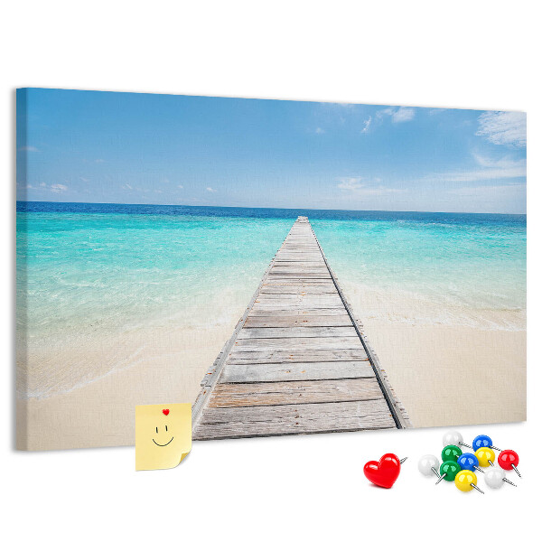 Prikbord met een rustige pier in een tropisch paradijs