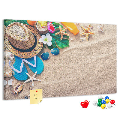 Kurken prikbord met zomerse strandherinneringen als decoratie