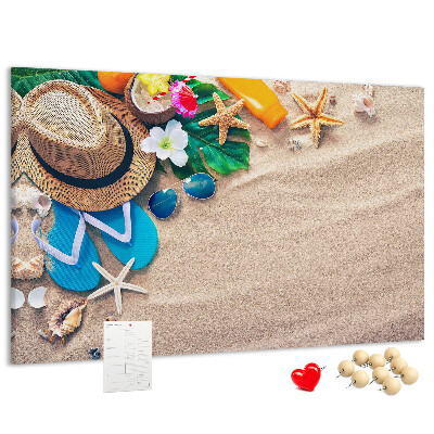 Kurken prikbord met zomerse strandherinneringen als decoratie