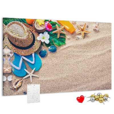 Kurken prikbord met zomerse strandherinneringen als decoratie