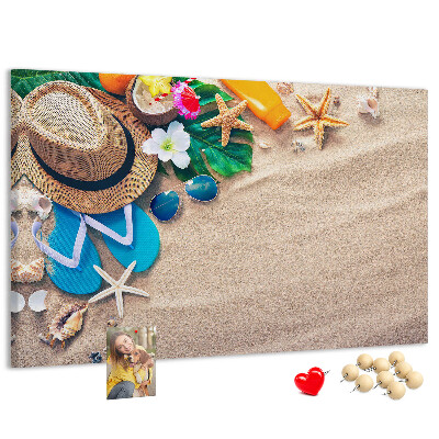 Kurken prikbord met zomerse strandherinneringen als decoratie