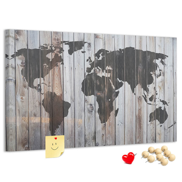 Prikbord wereldkaart op een achtergrond van houten planken