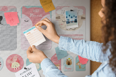 Kurk prikbord met gekleurde briefjes en schattige dieren