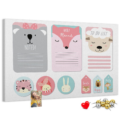 Kurk prikbord met gekleurde briefjes en schattige dieren