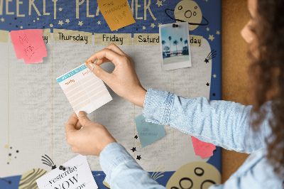 Kurkbord kosmische weekplanner met planeten en sterren