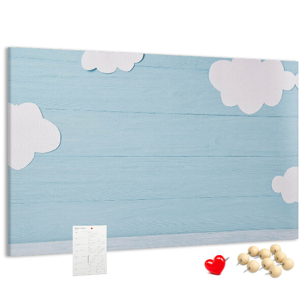 Prikbord met een hemel met wolken op een houten achtergrond