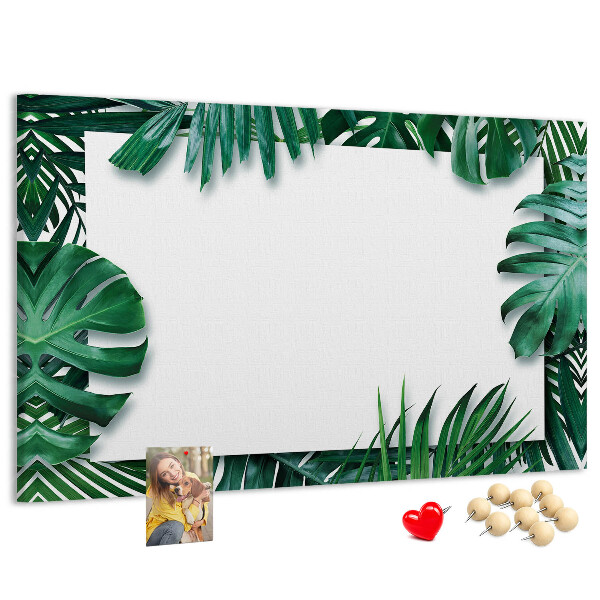 Kurken prikbord met een motief van tropische groene bladeren