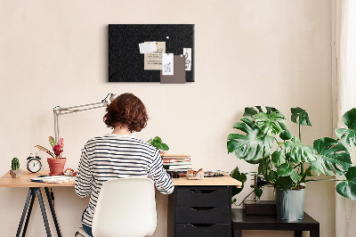 Prikbord zwart met gekleurde spelden