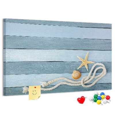 Prikbord met afbeelding van zeegezicht met schelpen en touw