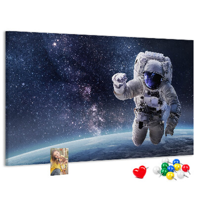 Kurken prikbord met astronaut in de ruimte