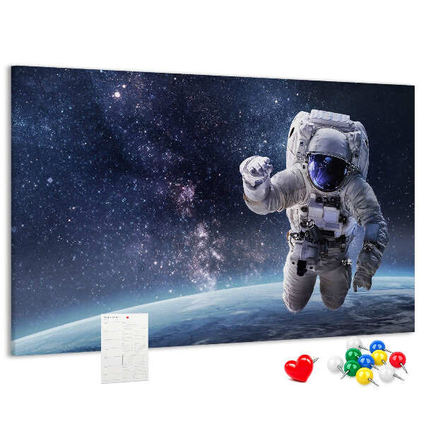 Kurken prikbord met astronaut in de ruimte