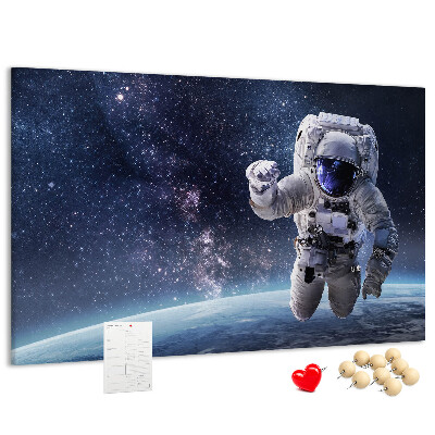 Kurken prikbord met astronaut in de ruimte