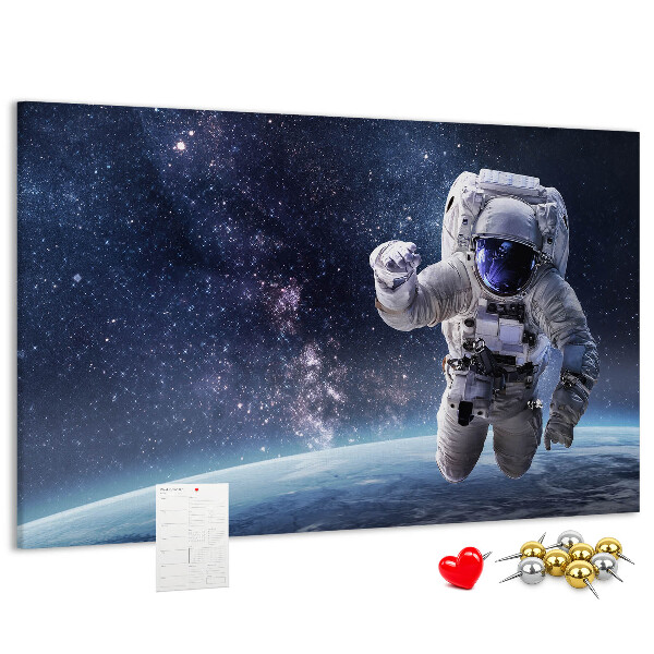 Kurken prikbord met astronaut in de ruimte