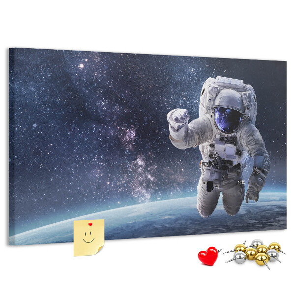 Kurken prikbord met astronaut in de ruimte