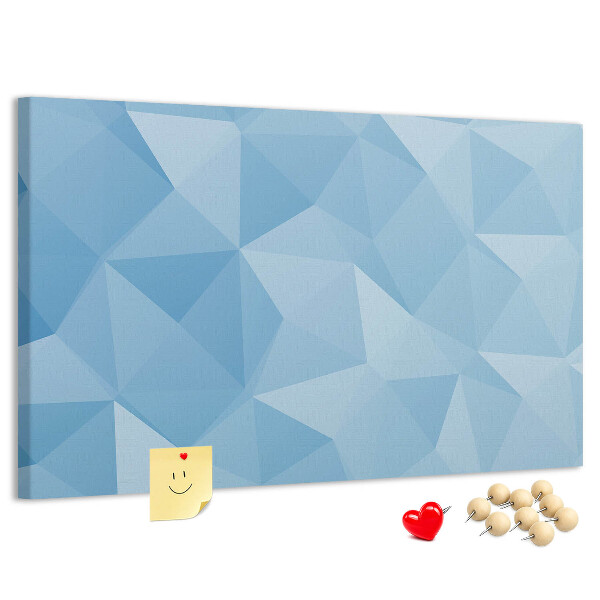 Prikbord met geometrische blauwe driehoeken in verschillende tinten