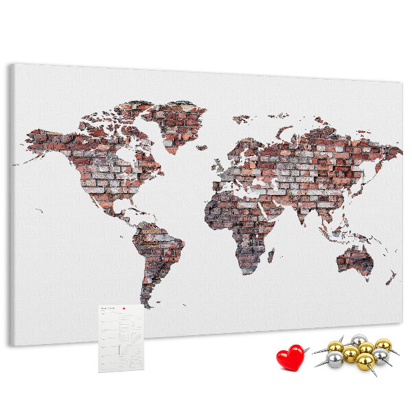 Kurk prikbord de wereldkaart tegen een bakstenen muur