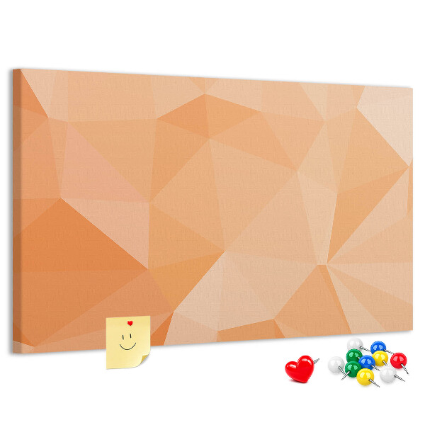 Prikbord met geometrische driehoeken in oranjetinten