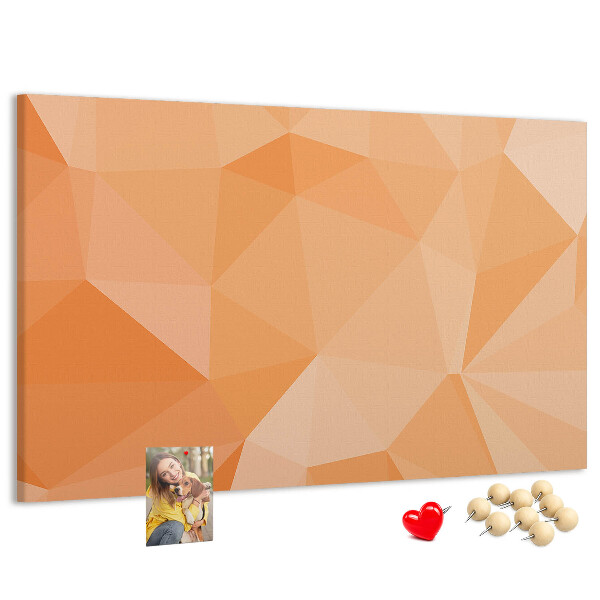 Prikbord met geometrische driehoeken in oranjetinten
