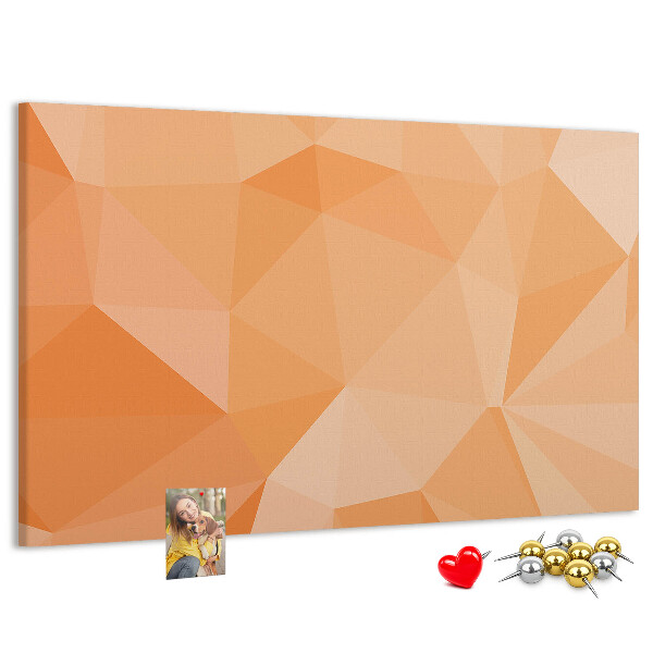 Prikbord met geometrische driehoeken in oranjetinten