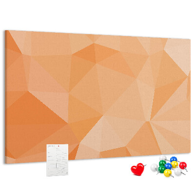 Prikbord met geometrische driehoeken in oranjetinten