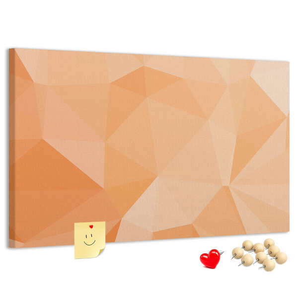 Prikbord met geometrische driehoeken in oranjetinten