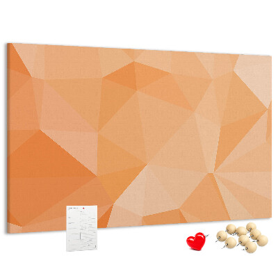 Prikbord met geometrische driehoeken in oranjetinten