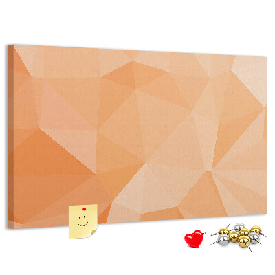 Prikbord met geometrische driehoeken in oranjetinten