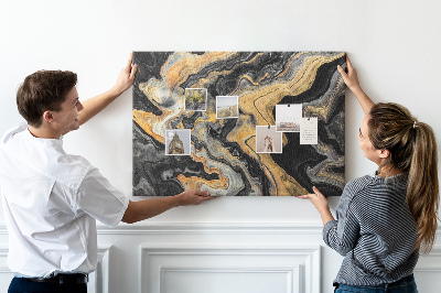 Kurkbord met een abstract patroon van gouden en zwarte golven