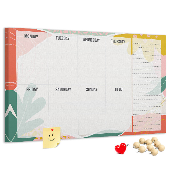Kurkbord met bloemenkalender en kleurrijke accenten