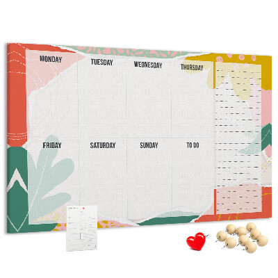Kurkbord met bloemenkalender en kleurrijke accenten