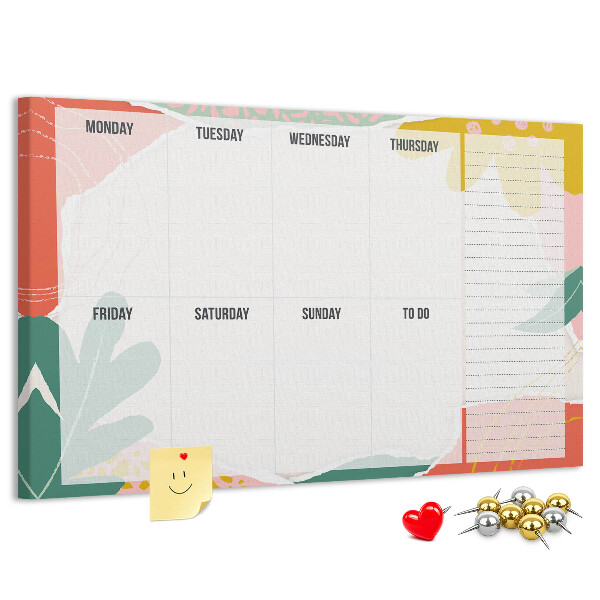 Kurkbord met bloemenkalender en kleurrijke accenten