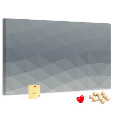 Kurkbord met geometrische driehoeken in grijstinten