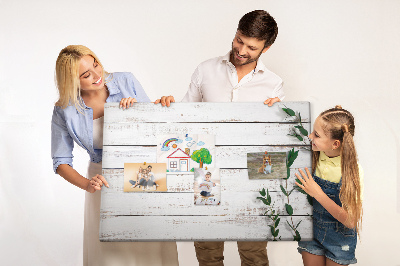 Kurk prikbord met rustiek hout en groene takken
