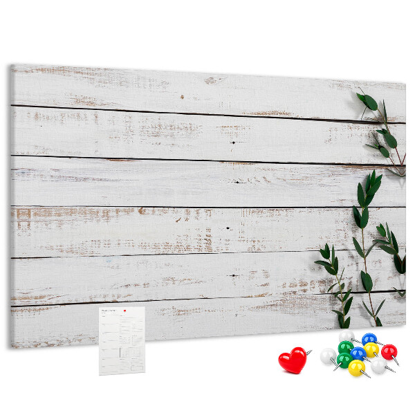 Kurk prikbord met rustiek hout en groene takken